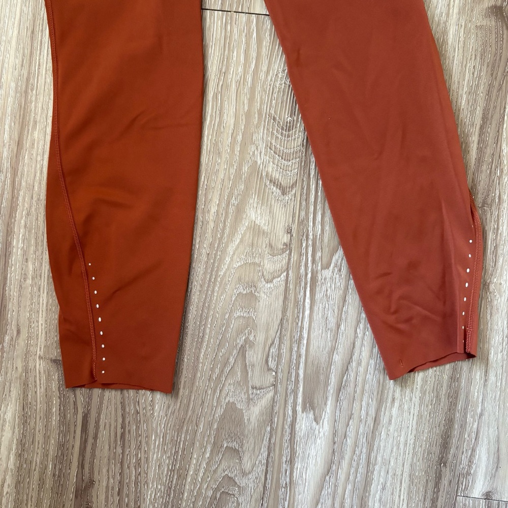 SOLD ***Lululemon Fast and free high rise tight leggings. Color Dark terracotta - Picture 8 of 11